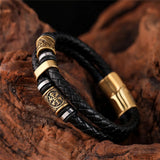 Pulsera de Cuero Negra Trenzada con Colgante de Oro