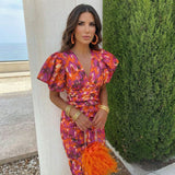 Natalia | Vestido midi ajustado con escote en V, mangas abullonadas y estampado vibrante