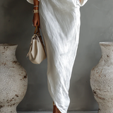 Carmen | Elegante vestido maxi de un solo hombro en blanco