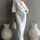 Carmen | Elegante vestido maxi de un solo hombro en blanco
